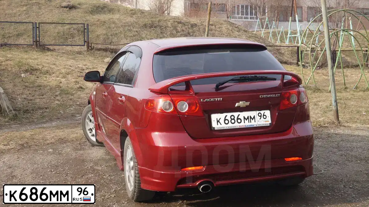 Фото автомобиля CHEVROLET LACETTI, 2007 — госномер С680РО196. Цвет: Т.КРАСНЫЙ