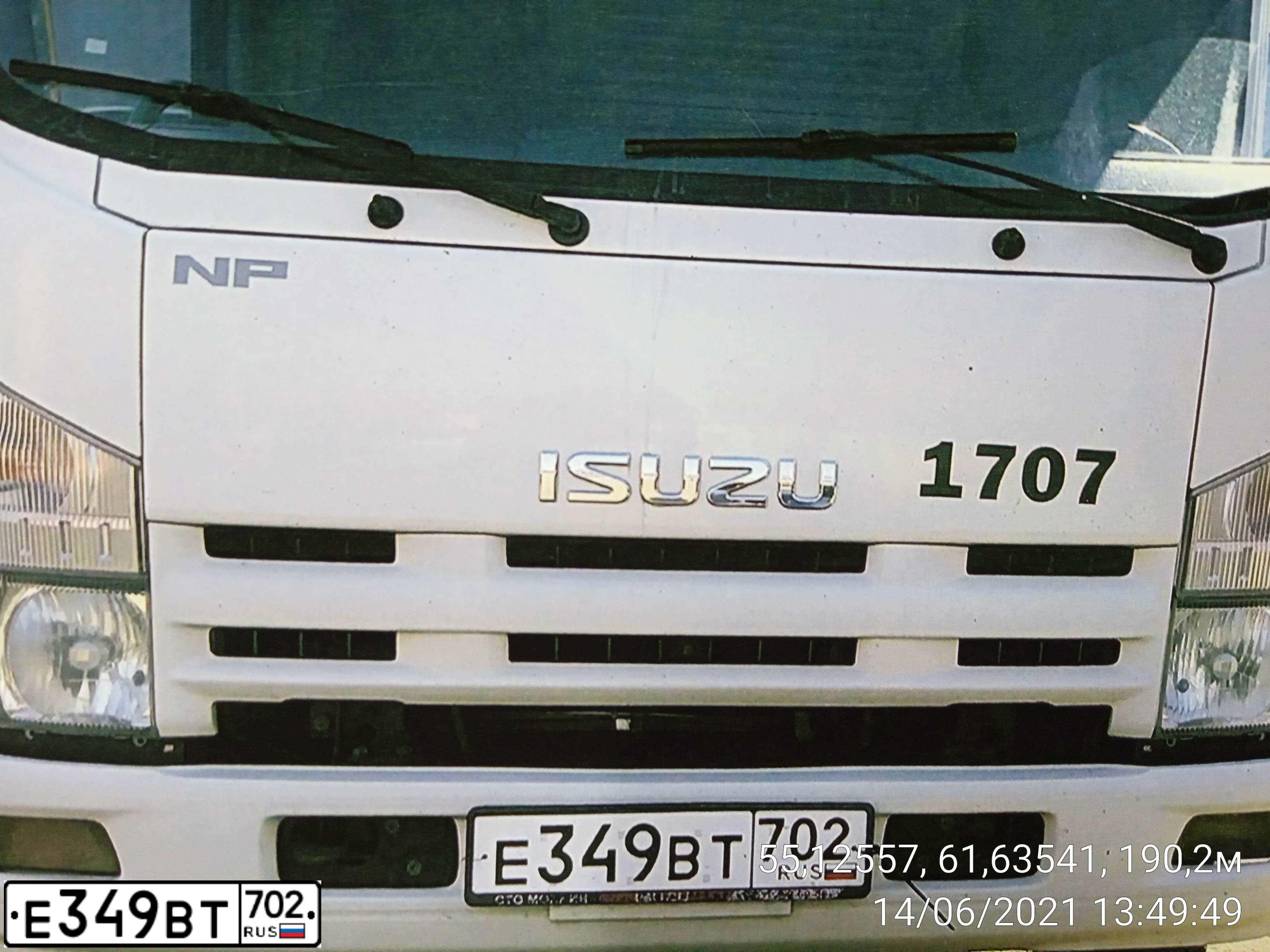 Фото автомобиля ISUZU NPR, 2014 — госномер Е349ВТ702. Цвет: Белый