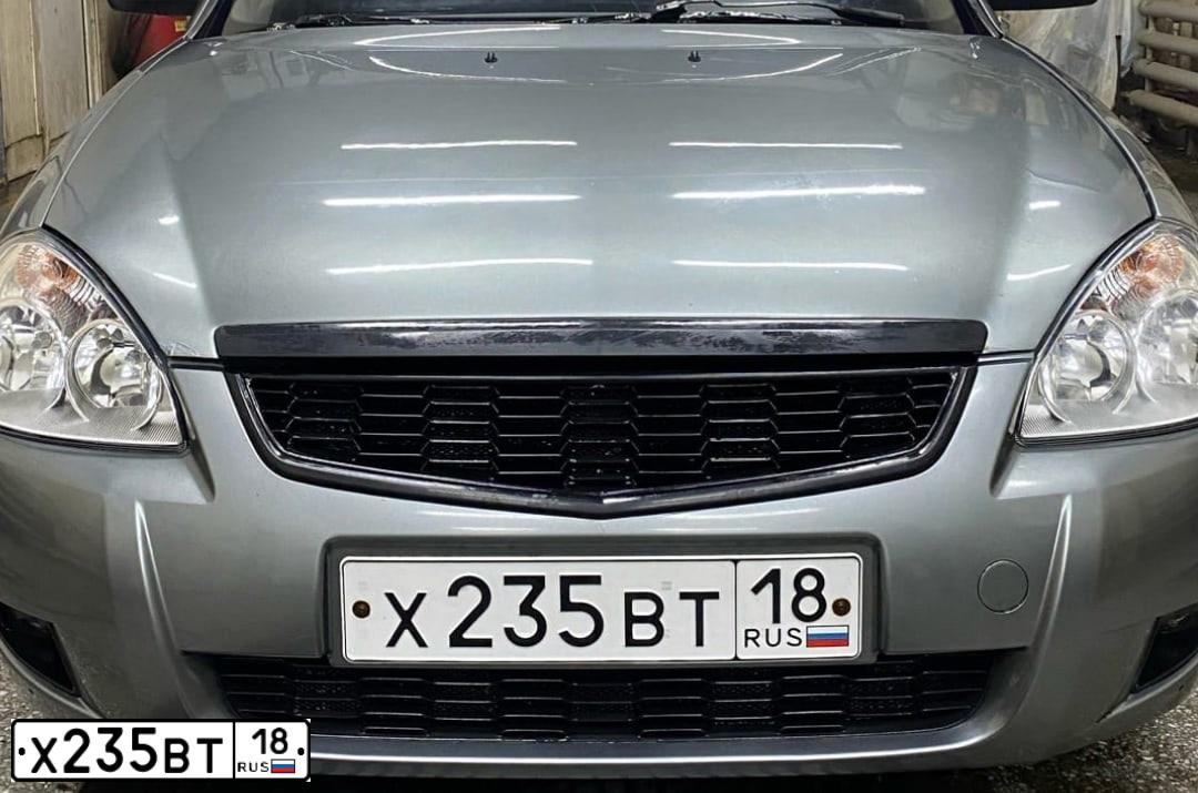 Фото автомобиля LADA 2172 PRIORA, 2011 — госномер Х235ВТ18. Цвет: СРЕДНИЙ СЕРО-ЗЕЛЕНЫЙ МЕТ