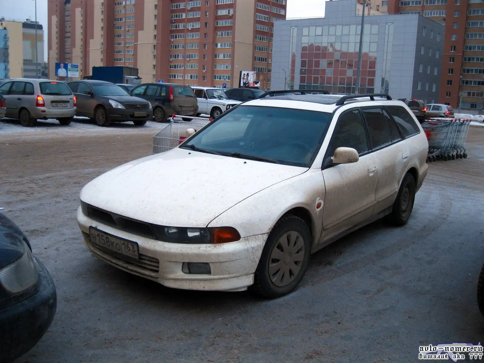 Фото автомобиля MITSUBISHI GALANT, 1997 — госномер В397ВК761. Цвет: Белый
