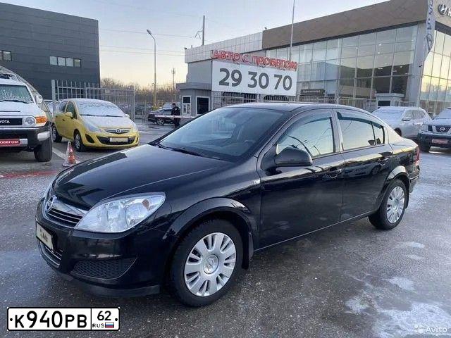 Фото автомобиля OPEL ASTRA, 2011 — госномер Е864ТТ62. Цвет: ЧЕРНЫЙ