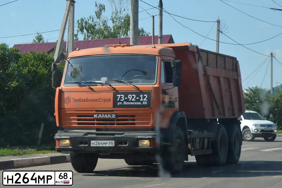 Фото автомобиля KAMAZ 65115 /6X4/, 2010 — госномер Р705КВ40. Цвет: Оранжевый