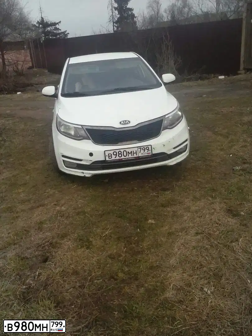 Фото автомобиля KIA RIO, 2016 — госномер В980МН799. Цвет: ЖЁЛТЫЙ