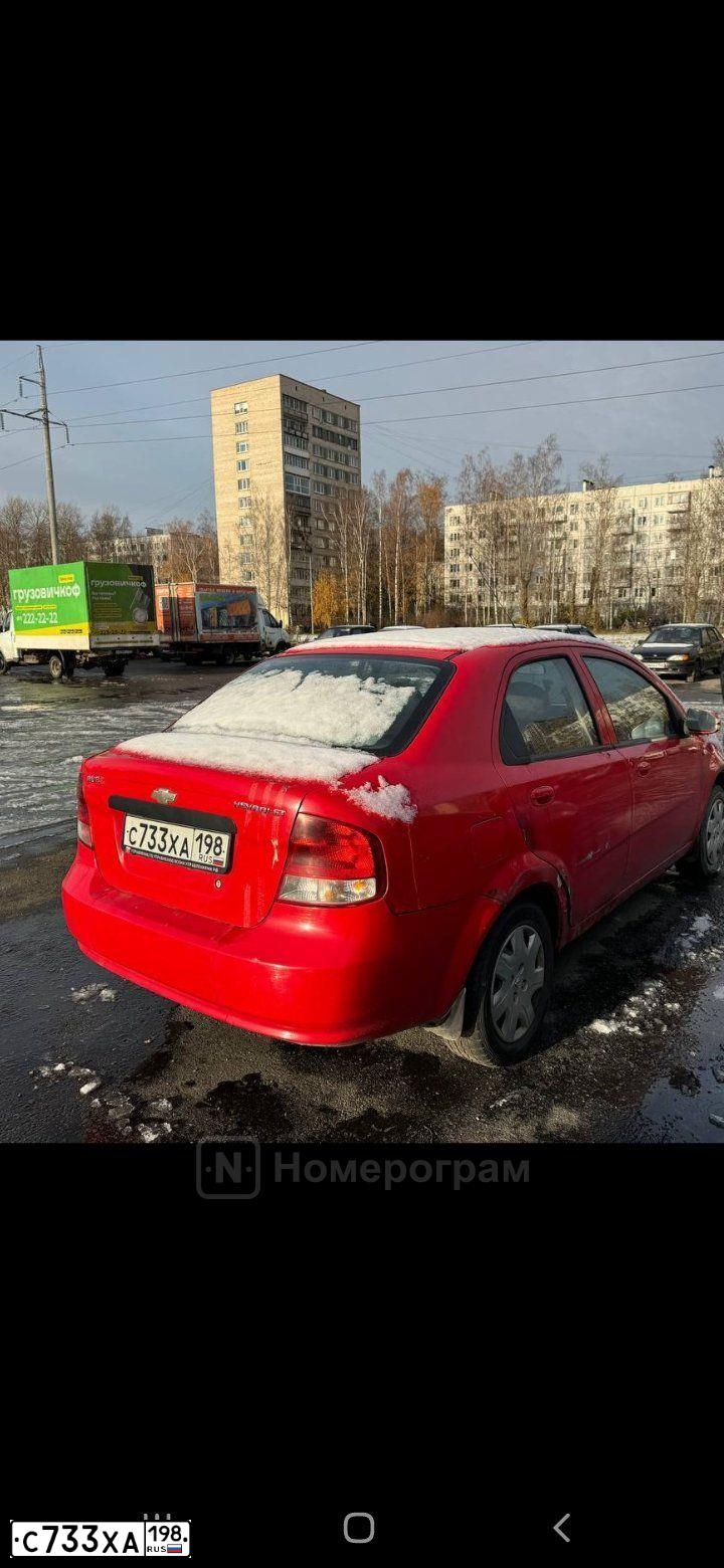 Фото автомобиля CHEVROLET AVEO, 2005 — госномер К269СР147. Цвет: Красный