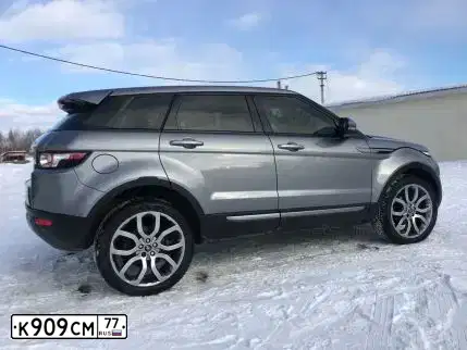 Фото автомобиля LANDROVER RANGE ROVER EVOQUE, 2012 — госномер А219НУ799. Цвет: СЕРЫЙ