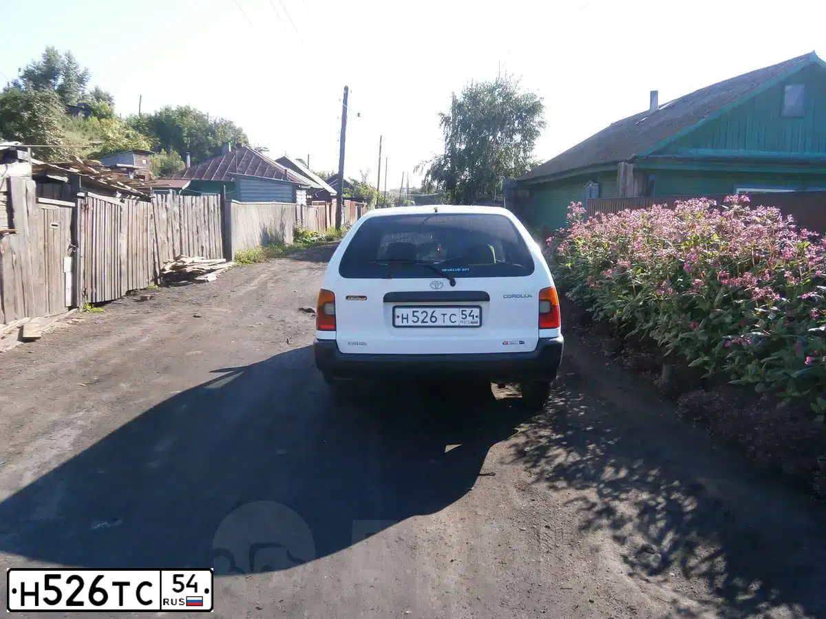 Фото автомобиля TOYOTA COROLLA, 1997 — госномер Х719АТ04