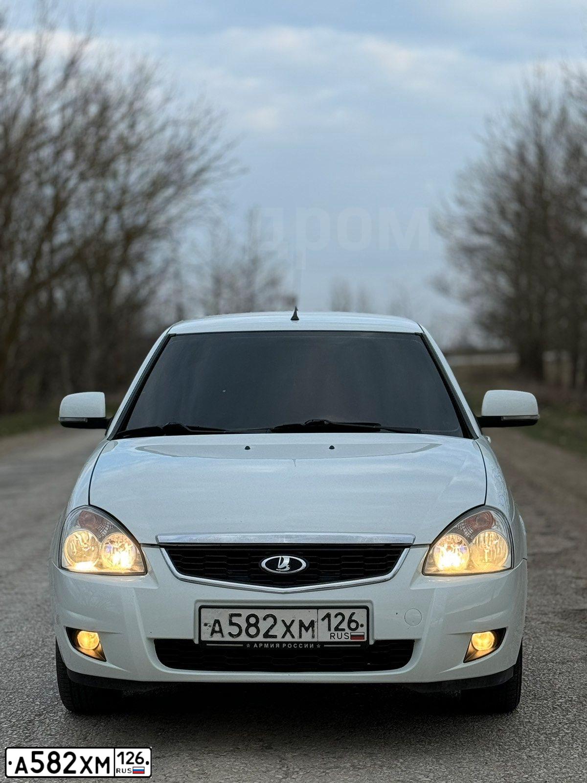 Фото автомобиля LADA 2170 PRIORA, 2015 — госномер Н958ТХ82. Цвет: Белый