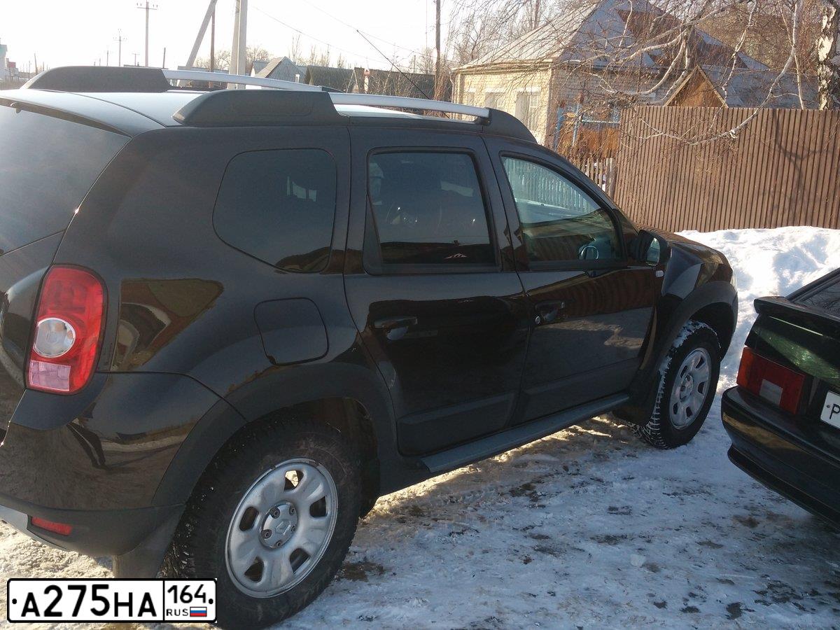 Фото автомобиля RENAULT DUSTER, 2014 — госномер М999ОМ64. Цвет: ТЕМНО КОРИЧНЕВЫЙ