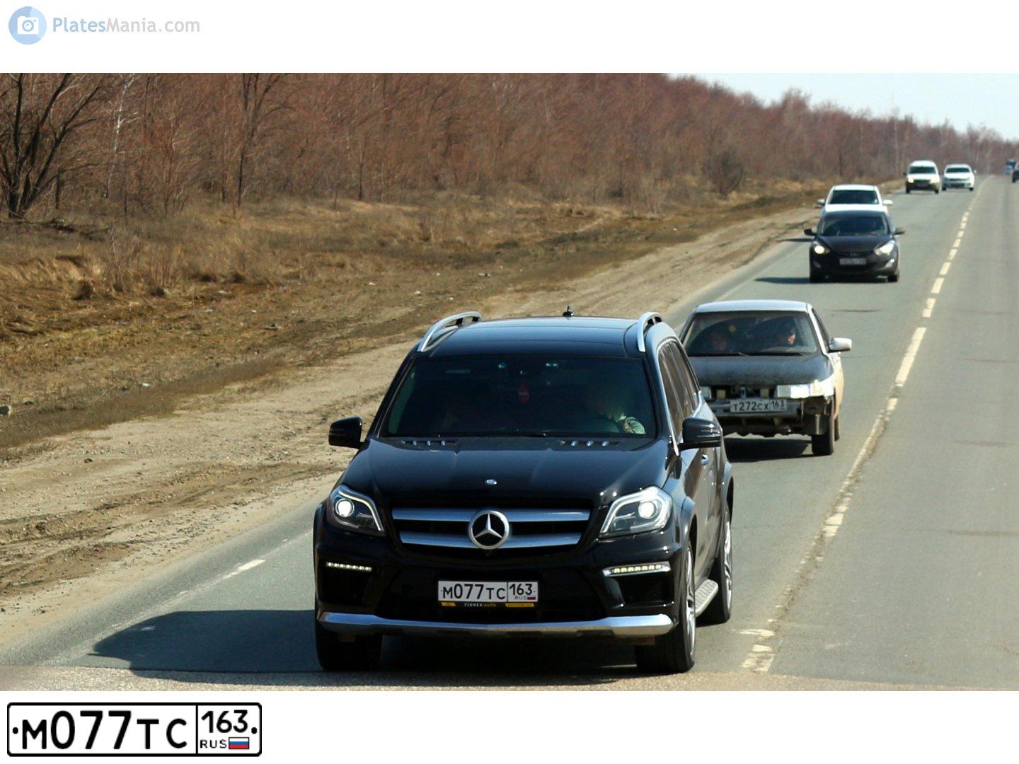 Фото автомобиля SSANGYONG KYRON, 2008 — госномер К037КН702. Цвет: голубой