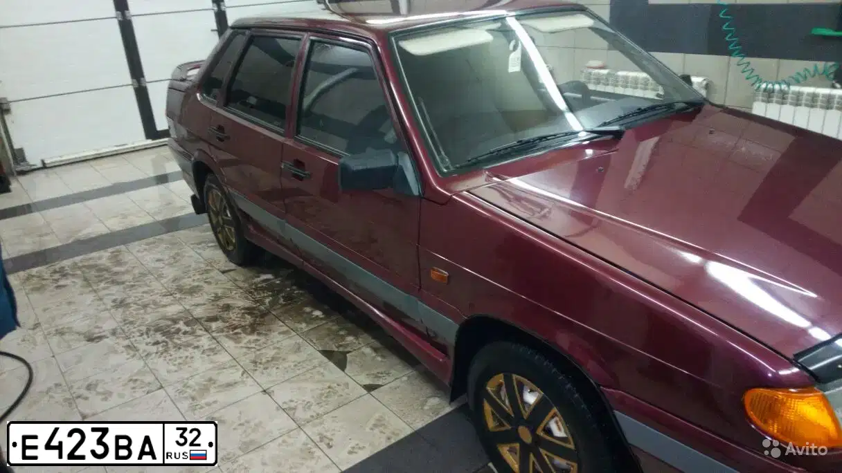 Фото автомобиля LADA 2115 SAMARA, 2005 — госномер Е423ВА32. Цвет: ТЕМНО-МАЛИНОВЫЙ