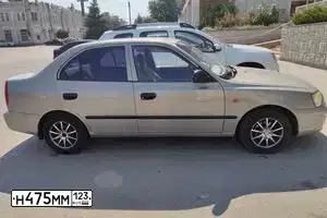 Фото автомобиля TAGAZ Z ACCENT, 2007 — госномер Н279ЕЕ761. Цвет: СВЕТЛО-БЕЖЕВЫЙ