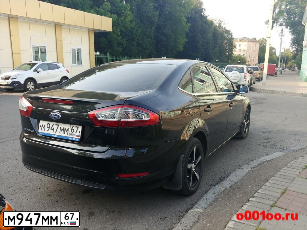 Фото автомобиля FORD MONDEO, 2011 — госномер М947ММ67. Цвет: ЧЕРНЫЙ