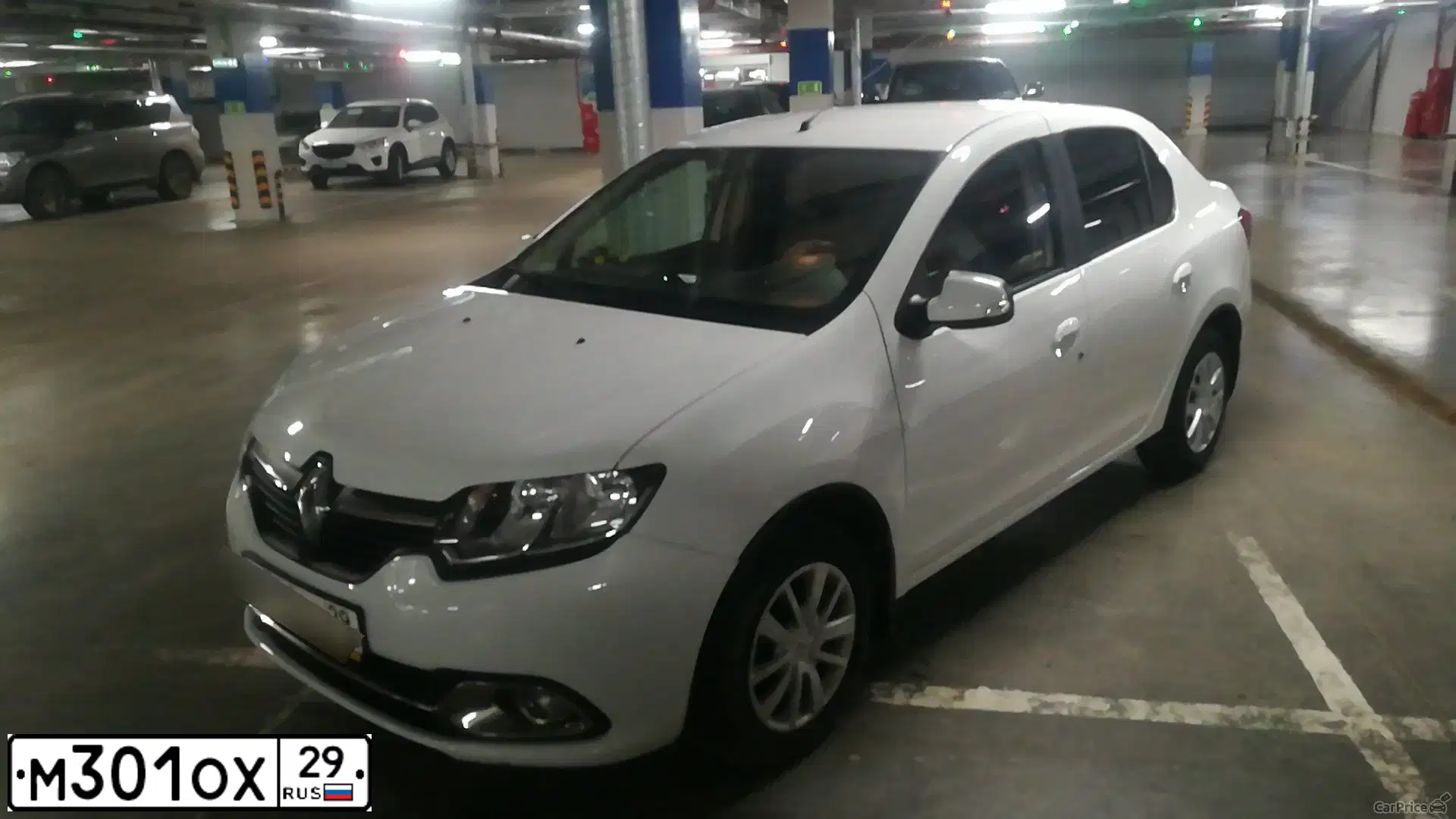 Фото автомобиля RENAULT LOGAN, 2018 — госномер М301ОХ29. Цвет: БЕЛЫЙ