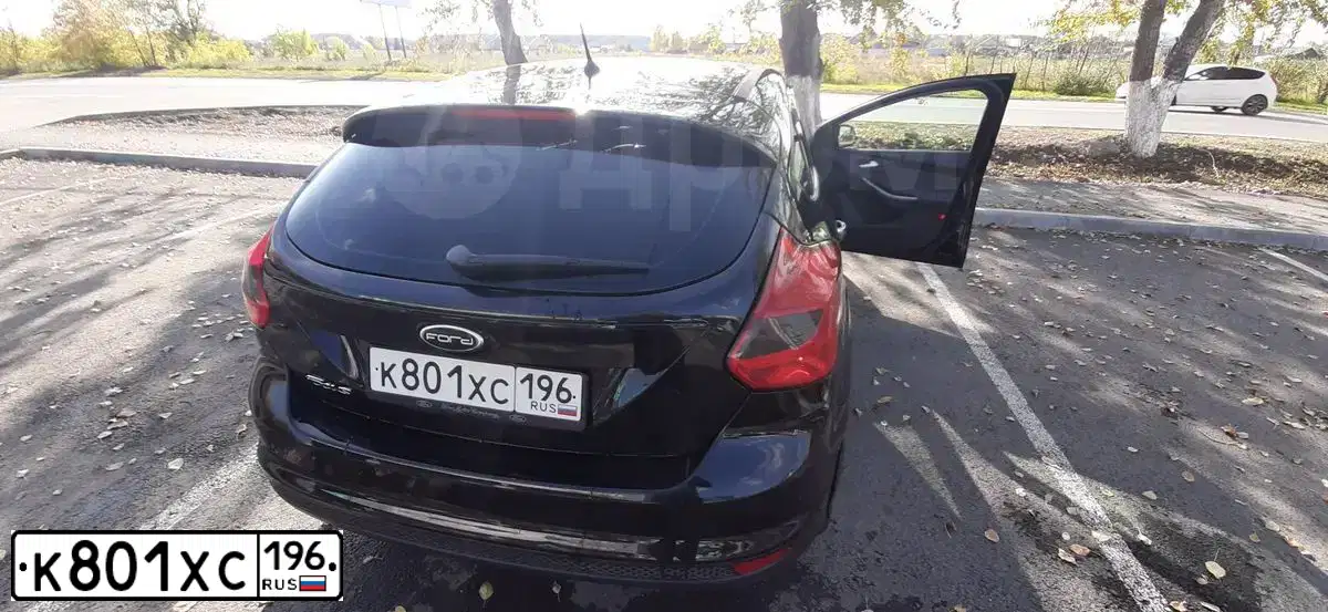 Фото автомобиля FORD FOCUS, 2011 — госномер К801ХС196. Цвет: ЧЕРНЫЙ