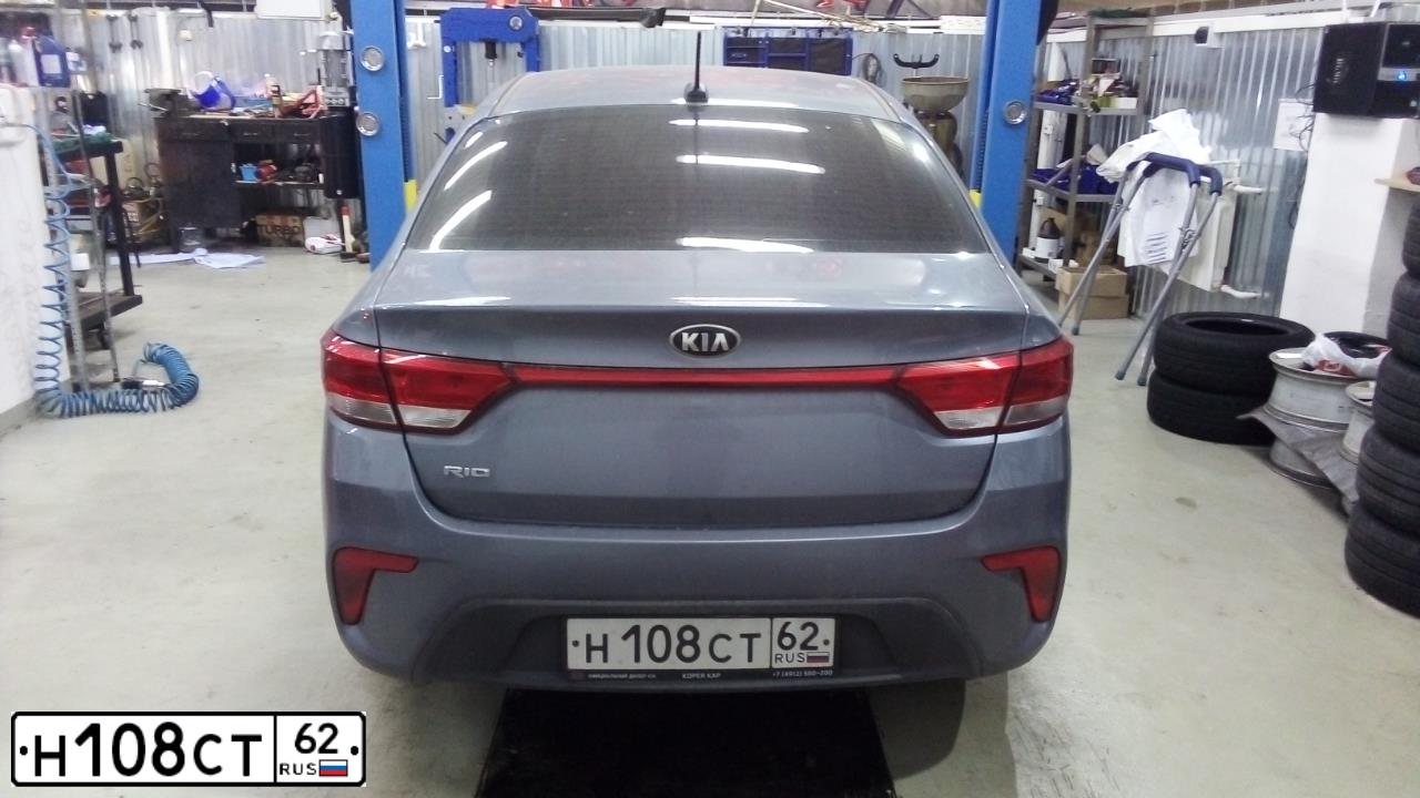 Фото автомобиля KIA RIO, 2017 — госномер Н108СТ62. Цвет: Серый