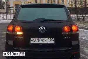 Фото автомобиля OPEL ASTRA, 2012 — госномер К310КК190. Цвет: СЕРЫЙ ТЕМНЫЙ