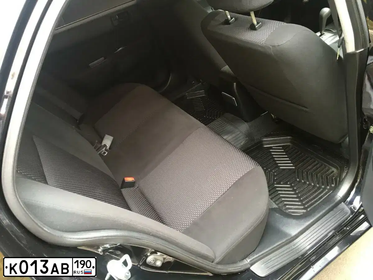 Фото автомобиля MITSUBISHI LANCER, 2009 — госномер К013АВ190. Цвет: ЧЕРНЫЙ