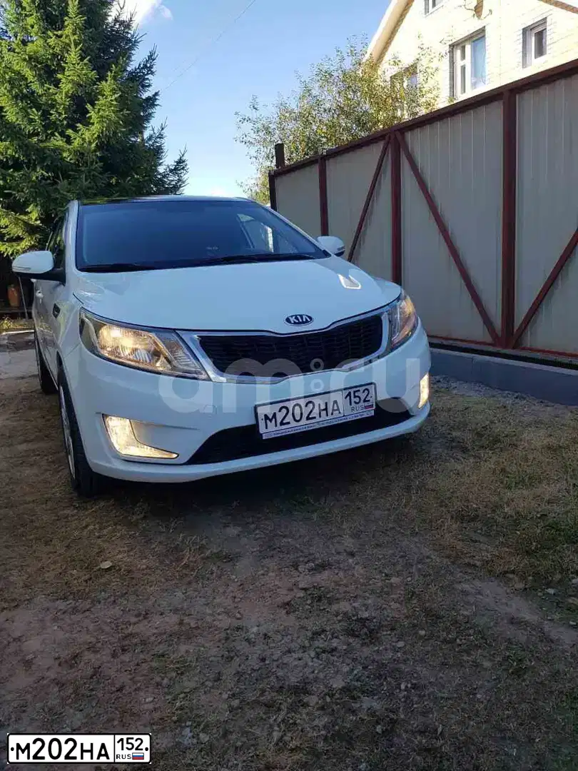 Фото автомобиля KIA RIO, 2013 — госномер О643ТК152. Цвет: Белый