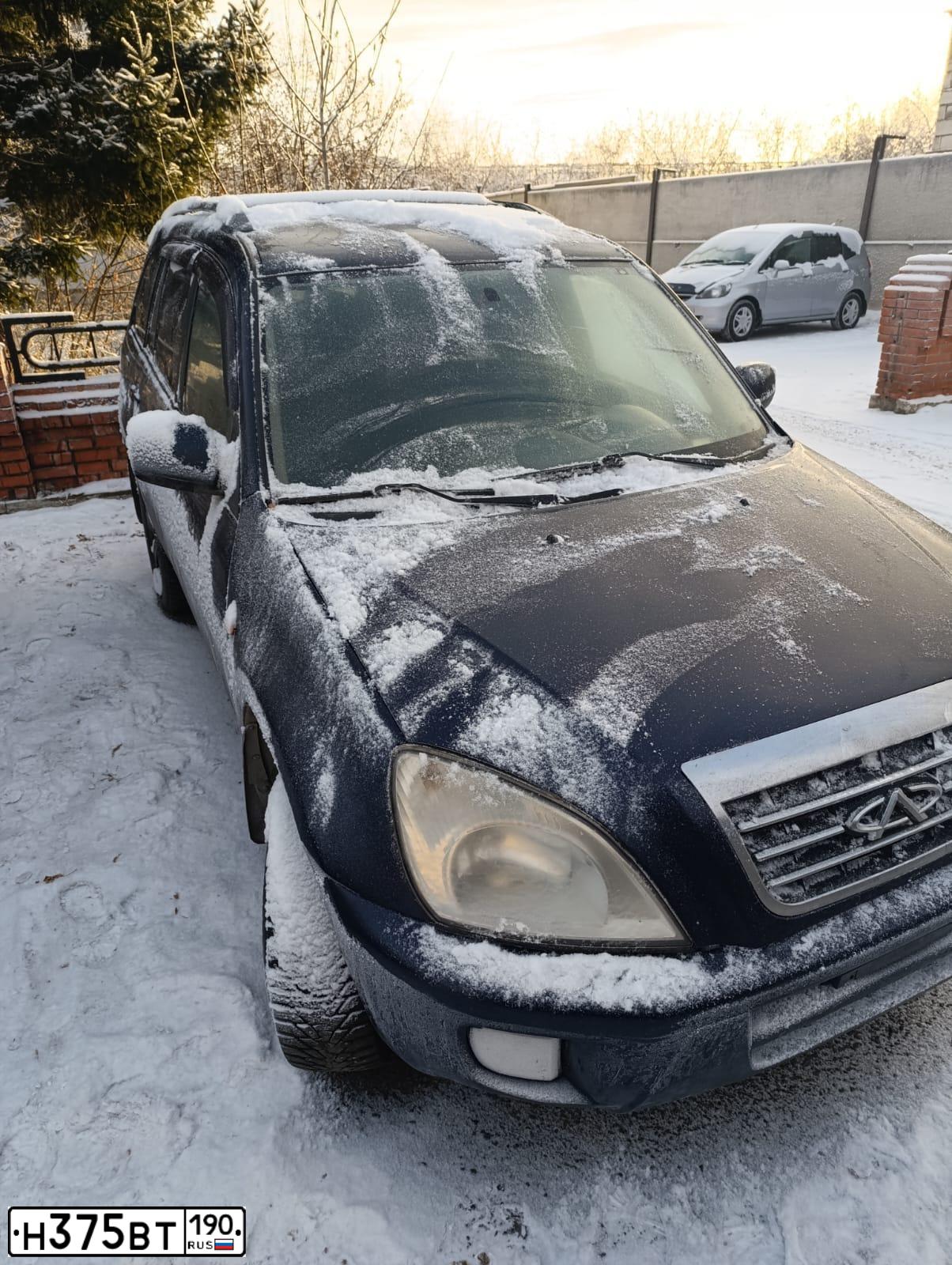 Фото автомобиля CHERY TIGGO, 2009 — госномер Н375ВТ190. Цвет: синий