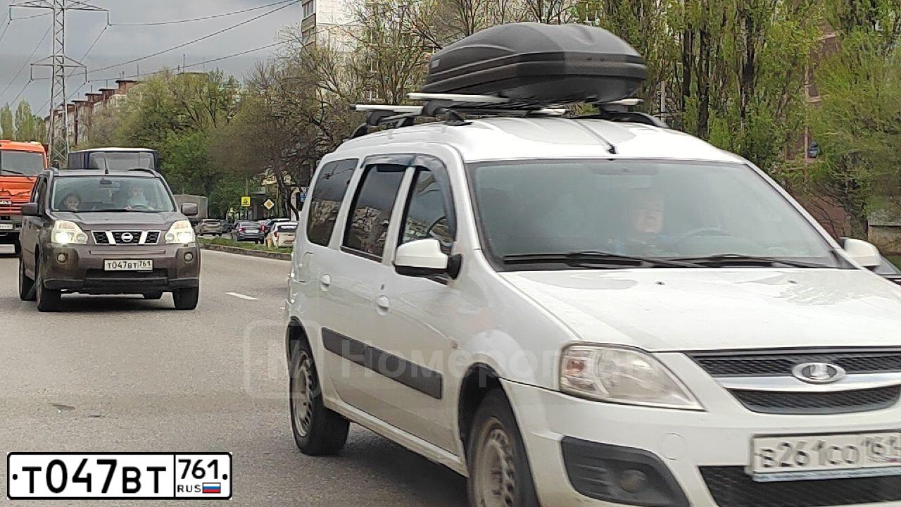Фото автомобиля NISSAN X-TRAIL, 2007 — госномер Т047ВТ761. Цвет: СЕРО-СИРЕНЕВЫЙ