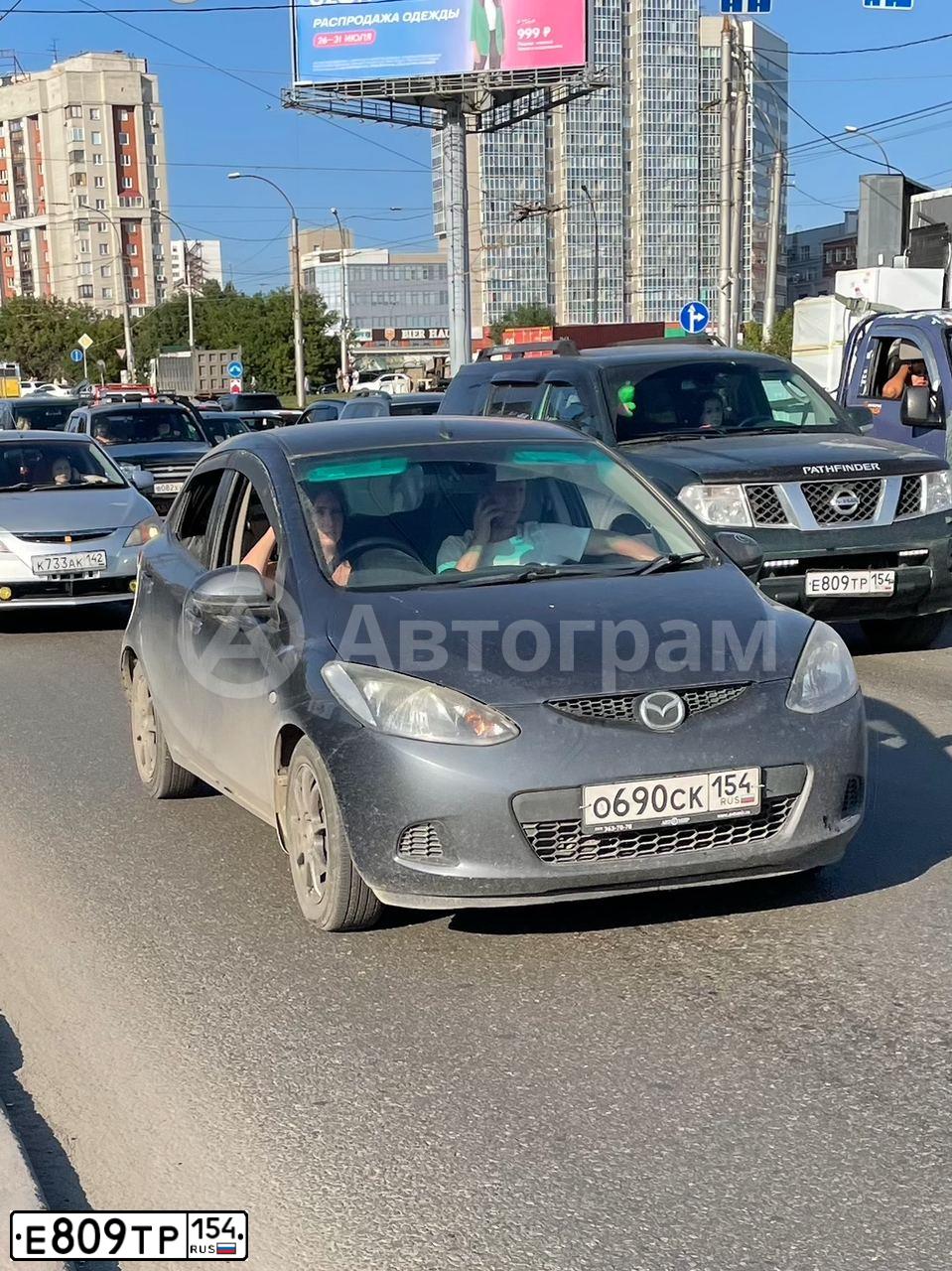 Фото автомобиля NISSAN PATHFINDER, 2008 — госномер Т806АК154. Цвет: ТЕМНО ЗЕЛЕНЫЙ