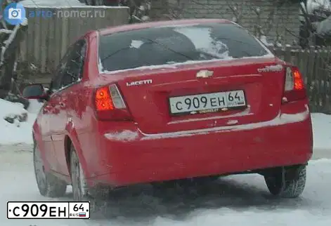 Фото автомобиля FORD FOCUS, 2012 — госномер С909ЕН64. Цвет: БЕЛЫЙ