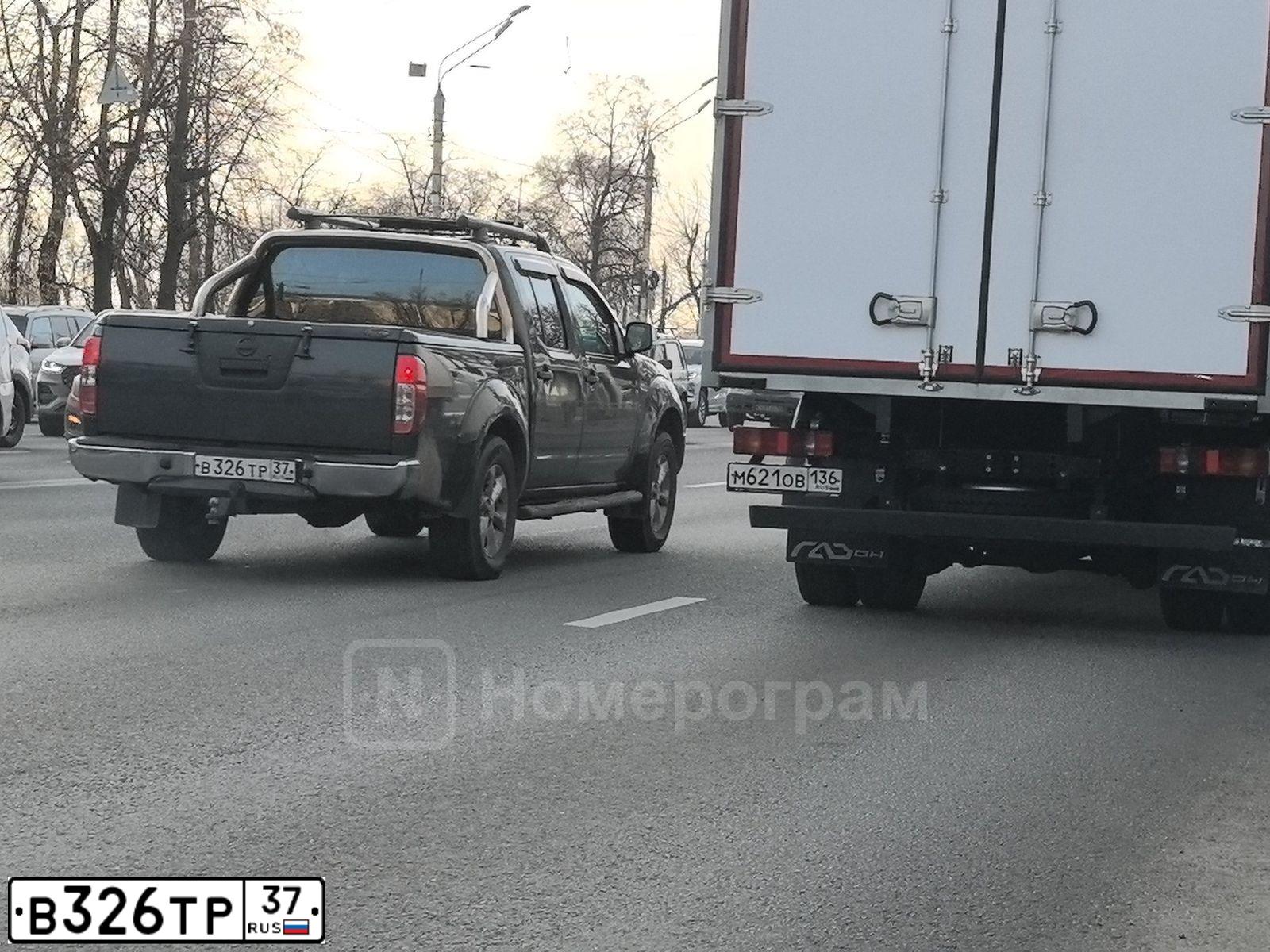 Фото автомобиля NISSAN NAVARA, 2007 — госномер В326ТР37. Цвет: СЕРЫЙ
