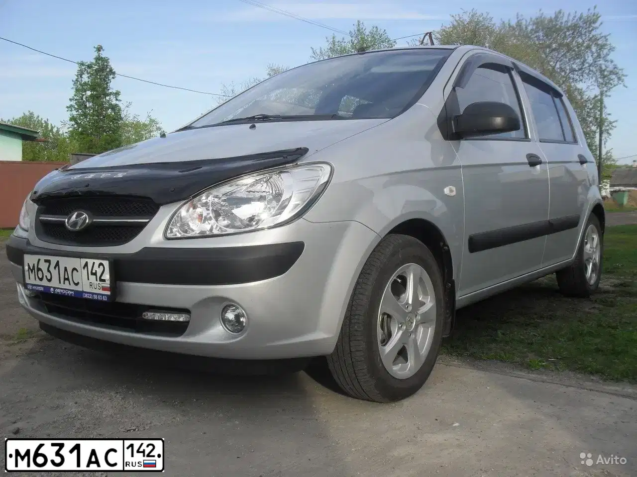 Фото автомобиля HYUNDAI GETZ, 2010 — госномер Н149УМ70. Цвет: Серебристый