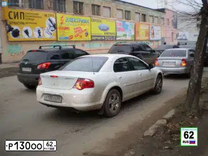 Фото автомобиля GAZ WOLGA SIBER, 2010 — госномер Р130ОО62. Цвет: БЕЛЫЙ