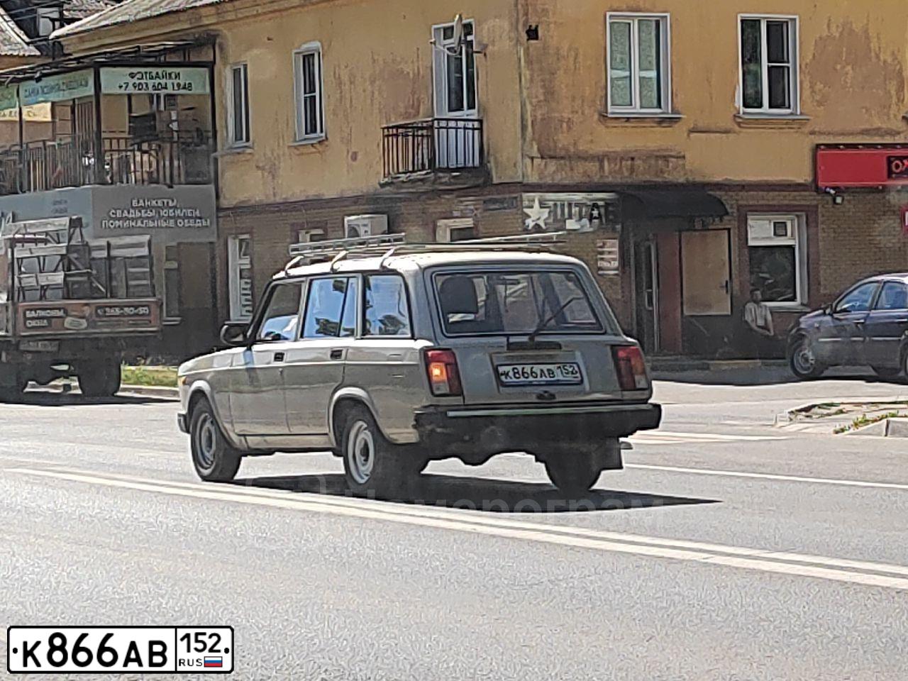Фото автомобиля ISUZU TROOPER, 1987 — госномер О357ОВ44. Цвет: ТЕМНО-КРАСНЫЙ