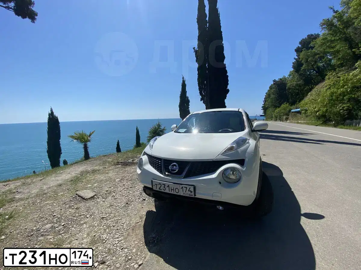 Фото автомобиля NISSAN JUKE, 2011 — госномер Е569ОР193. Цвет: Белый