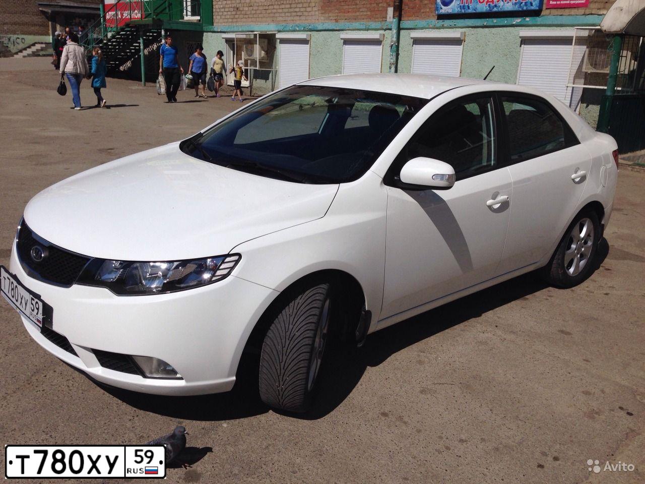 Фото автомобиля KIA CERATO, 2010 — госномер Т292ЕА152. Цвет: Белый