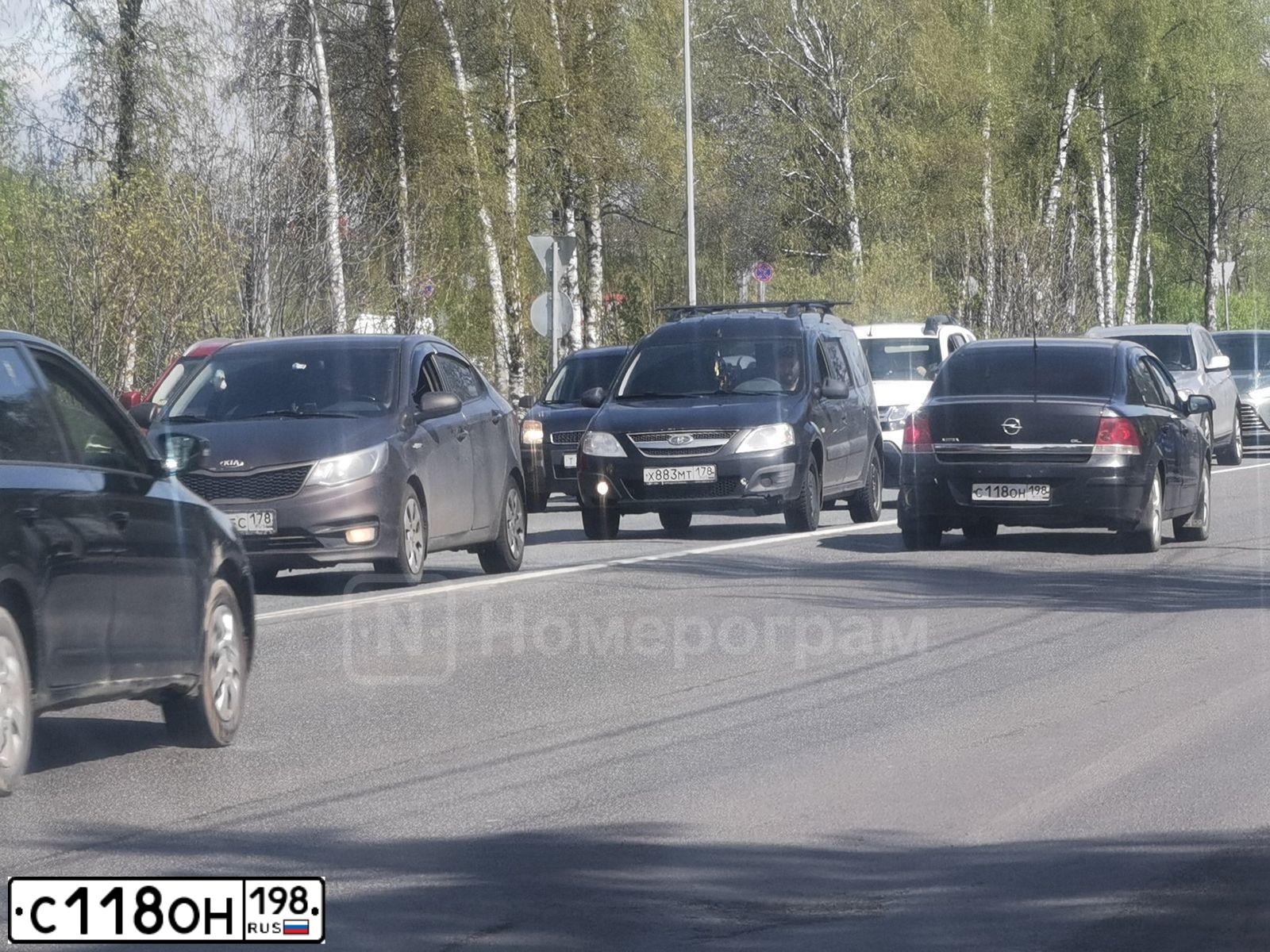 Фото автомобиля OPEL ASTRA, 2013 — госномер С118ОН198. Цвет: ЧЕРНЫЙ