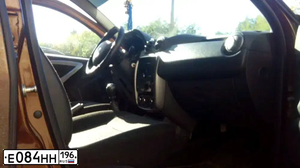 Фото автомобиля RENAULT DUSTER, 2013 — госномер Р279УМ196. Цвет: Коричневый