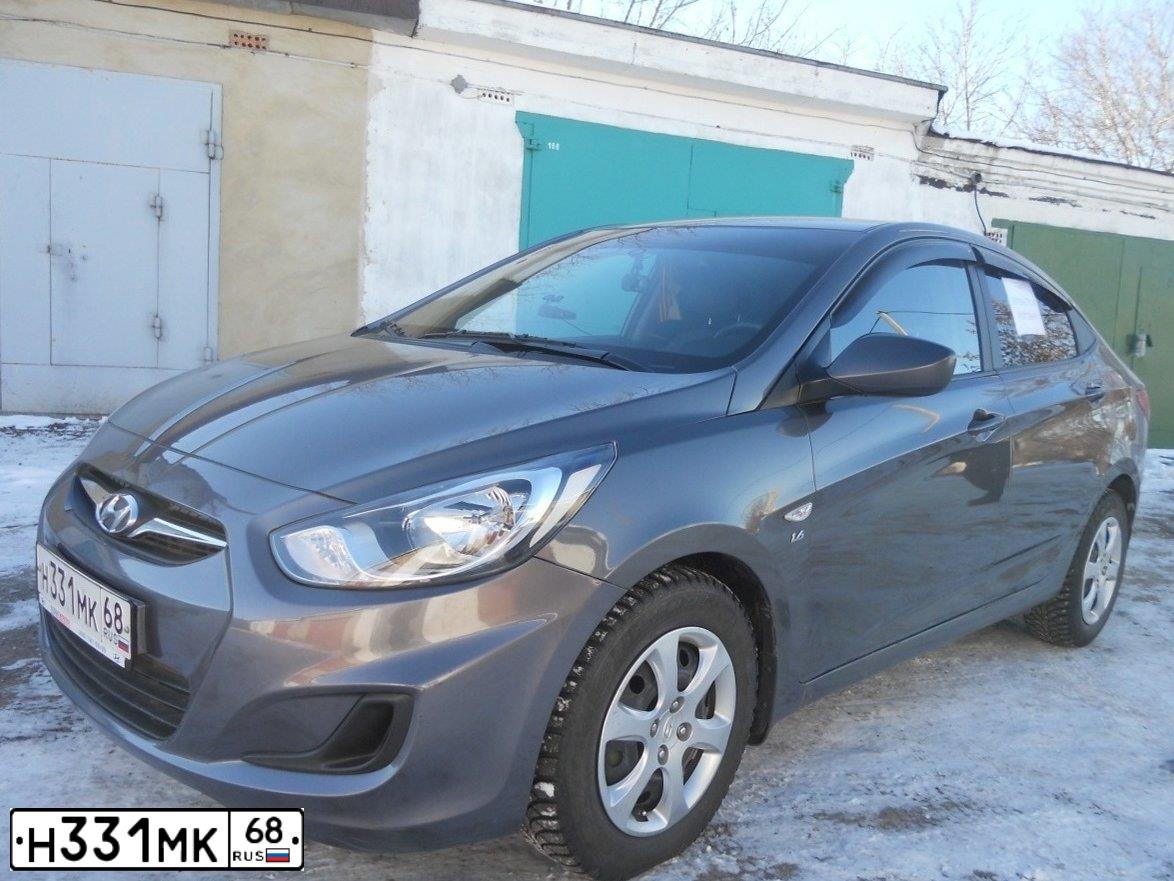 Фото автомобиля HYUNDAI SOLARIS, 2013 — госномер О146РС48. Цвет: ЧЕРНО-СЕРЫЙ