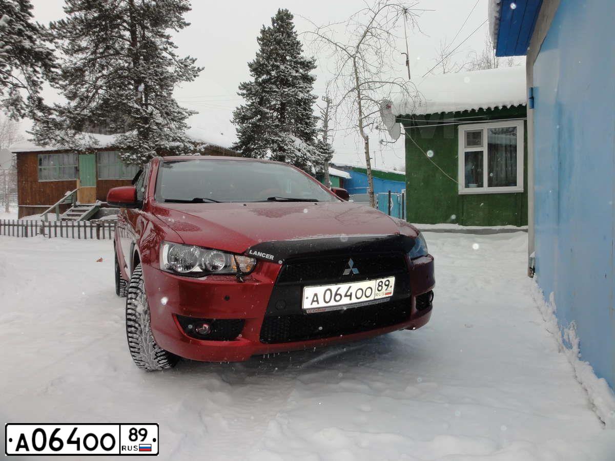 Фото автомобиля МИЦУБИСИ ЛАНСЕР, 2007 — госномер В590ВС92. Цвет: Красный