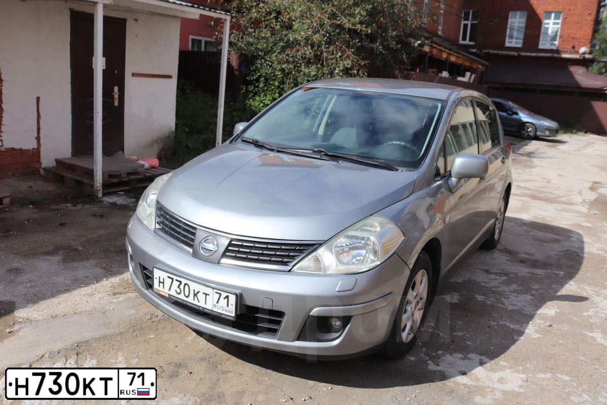 Фото автомобиля NISSAN TIIDA, 2008 — госномер Н730КТ71. Цвет: СЕРЫЙ