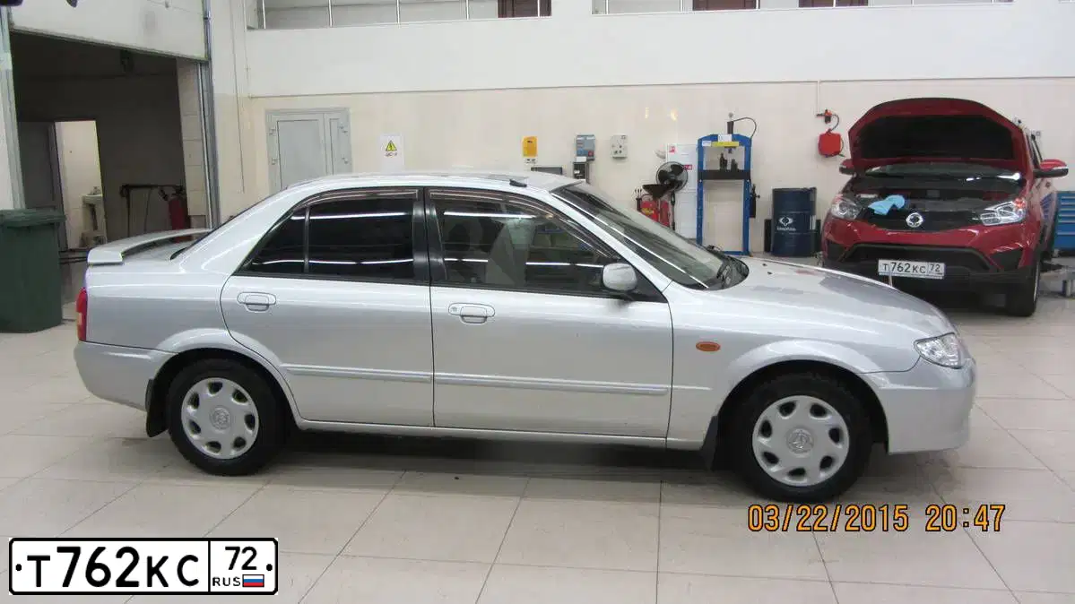Фото автомобиля SSANGYONG ACTYON, 2014 — госномер Т762КС72. Цвет: КРАСНЫЙ