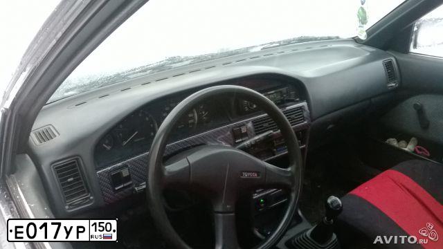 Фото автомобиля TOYOTA ТОЙОТА КОРОЛЛА, 1990 — госномер Н756РР77. Цвет: Серый