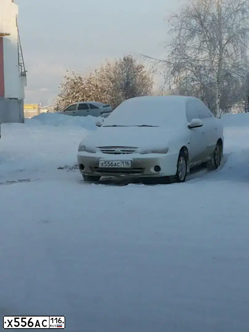 Фото автомобиля KIA SPECTRA, 2007 — госномер К195ОР116. Цвет: Белый