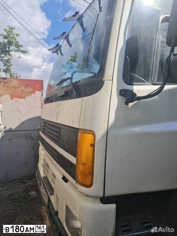 Фото автомобиля DAF 85, 1996 — госномер В180АМ161. Цвет: СЕРЫЙ