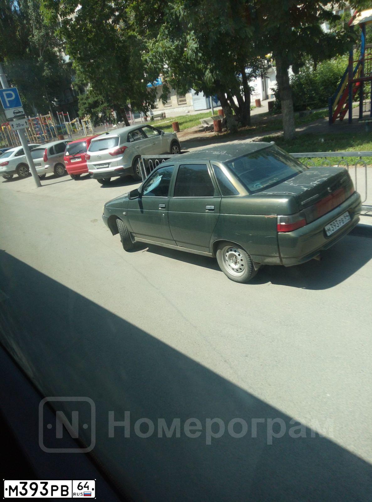 Фото автомобиля LADA 2110, 2004 — госномер Е374НМ164. Цвет: ТЕМНО ЗЕЛЕНЫЙ