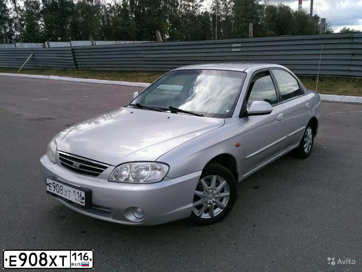 Фото автомобиля KIA SPECTRA, 2008 — госномер Е014ХА21. Цвет: АЛМАЗ.СЕРЕБРО