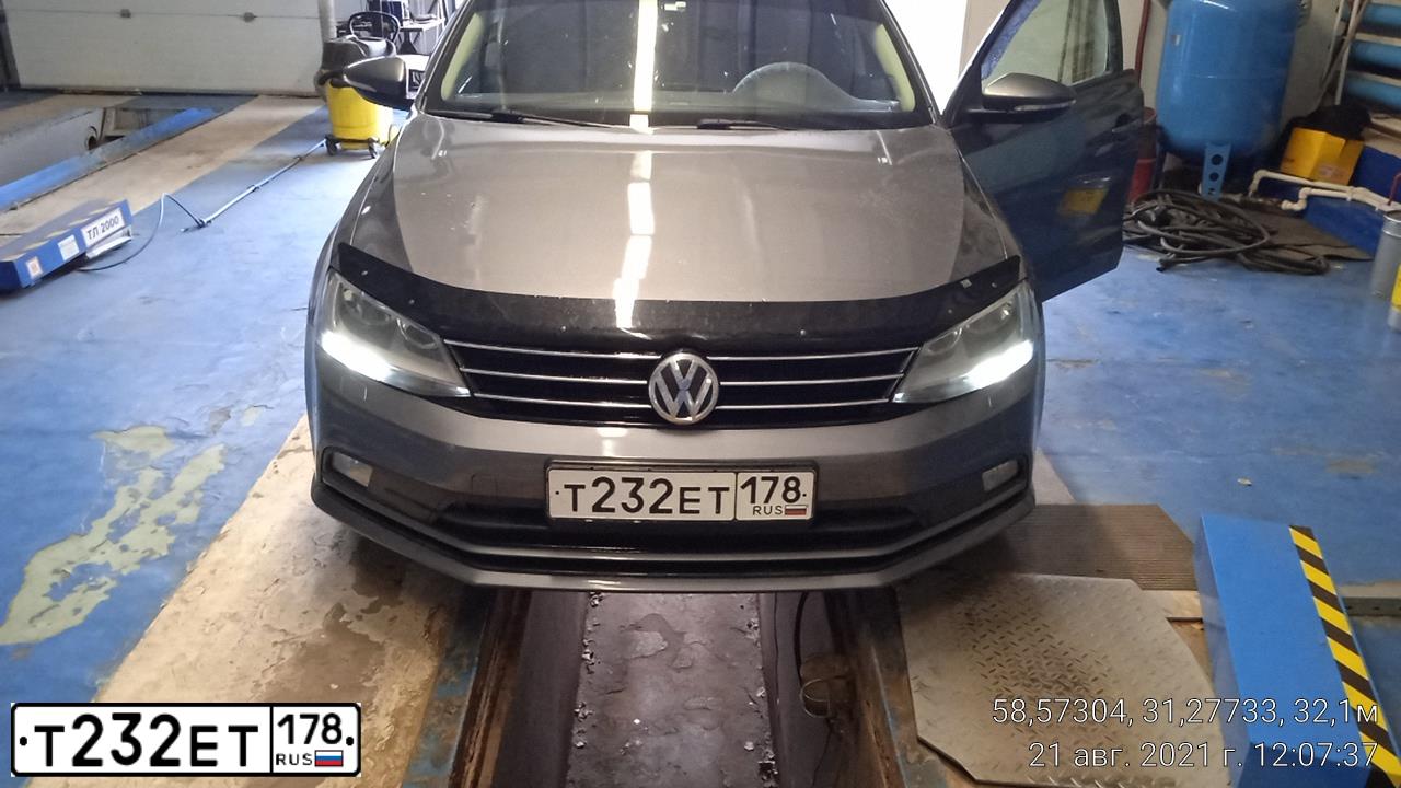 Фото автомобиля VOLKSWAGEN JETTA, 2014 — госномер К874ОН53. Цвет: ТЕМНО-СЕРЫЙ