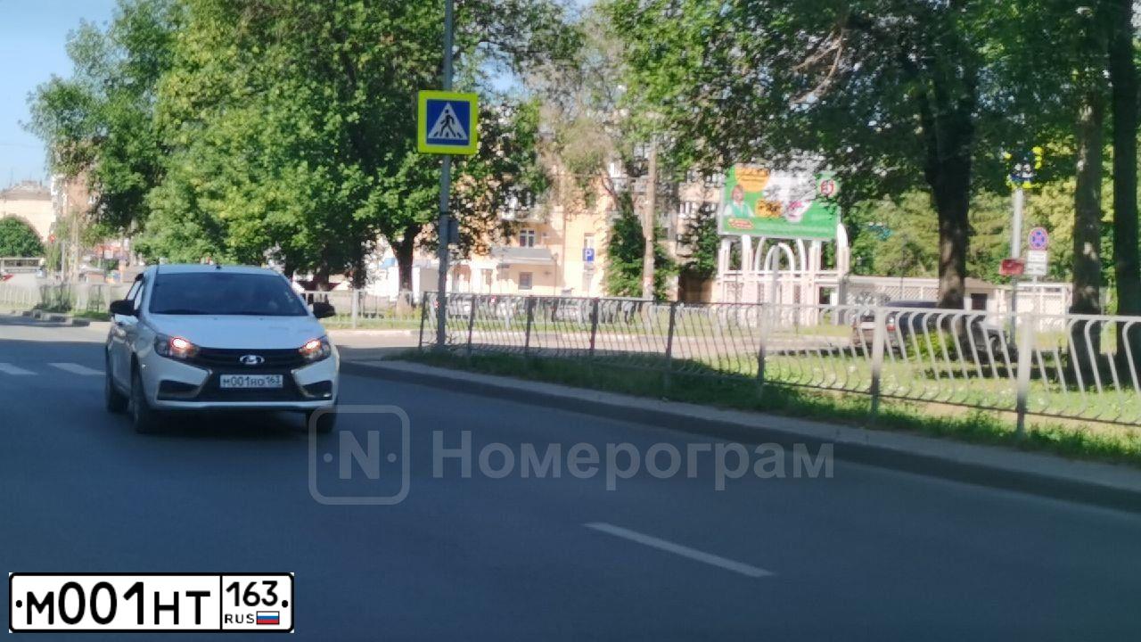 Фото автомобиля LADA 2107, 2002 — госномер М001НТ163. Цвет: СИНЕ-ЗЕЛЕНЫЙ