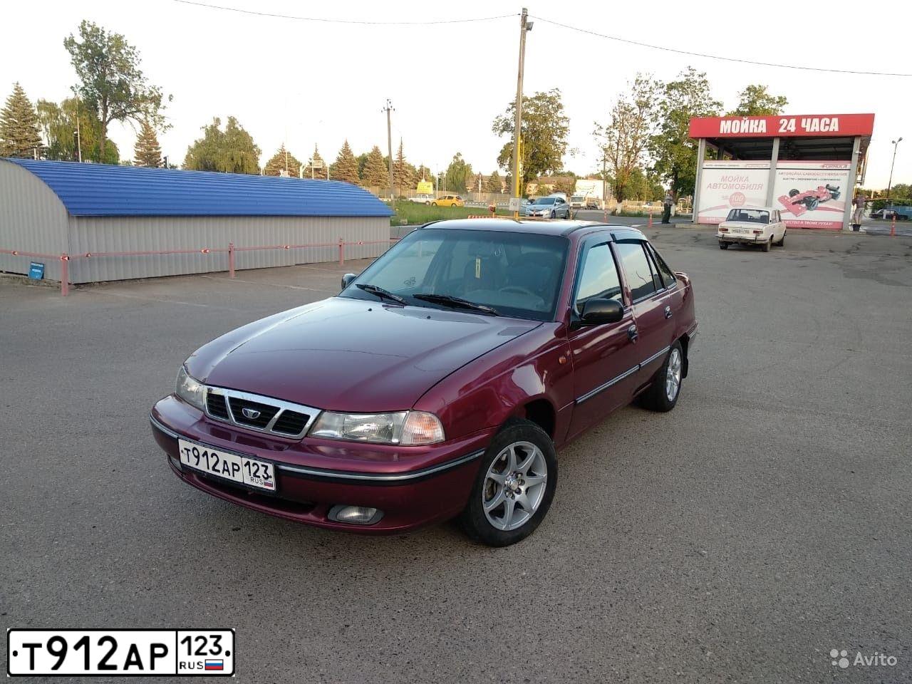 Фото автомобиля DAEWOO NEXIA, 2008 — госномер К756ВК01. Цвет: СПЕЛАЯ ВИШНЯ