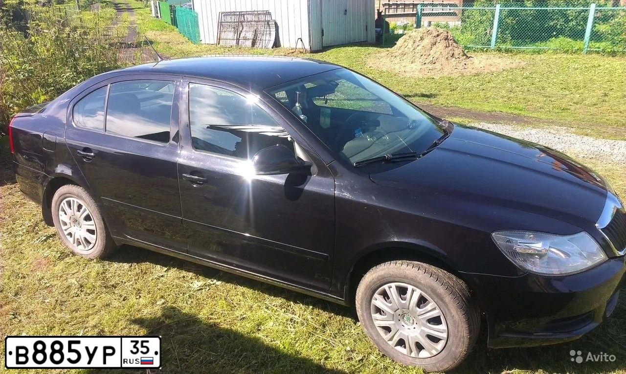 Фото автомобиля SKODA OCTAVIA, 2012 — госномер Н161АК35. Цвет: ЧЕРНЫЙ