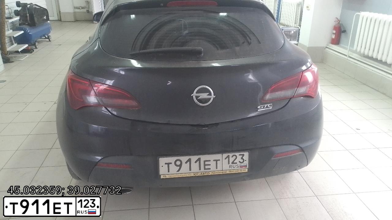 Фото автомобиля OPEL ASTRA, 2012 — госномер Т911ЕТ123. Цвет: ЧЕРНЫЙ