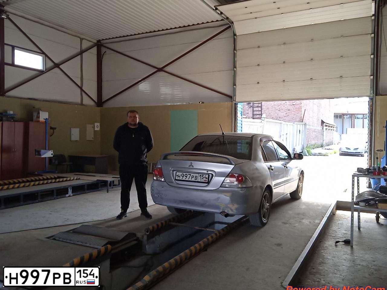 Фото автомобиля MITSUBISHI LANCER, 2003 — госномер Н997РВ154