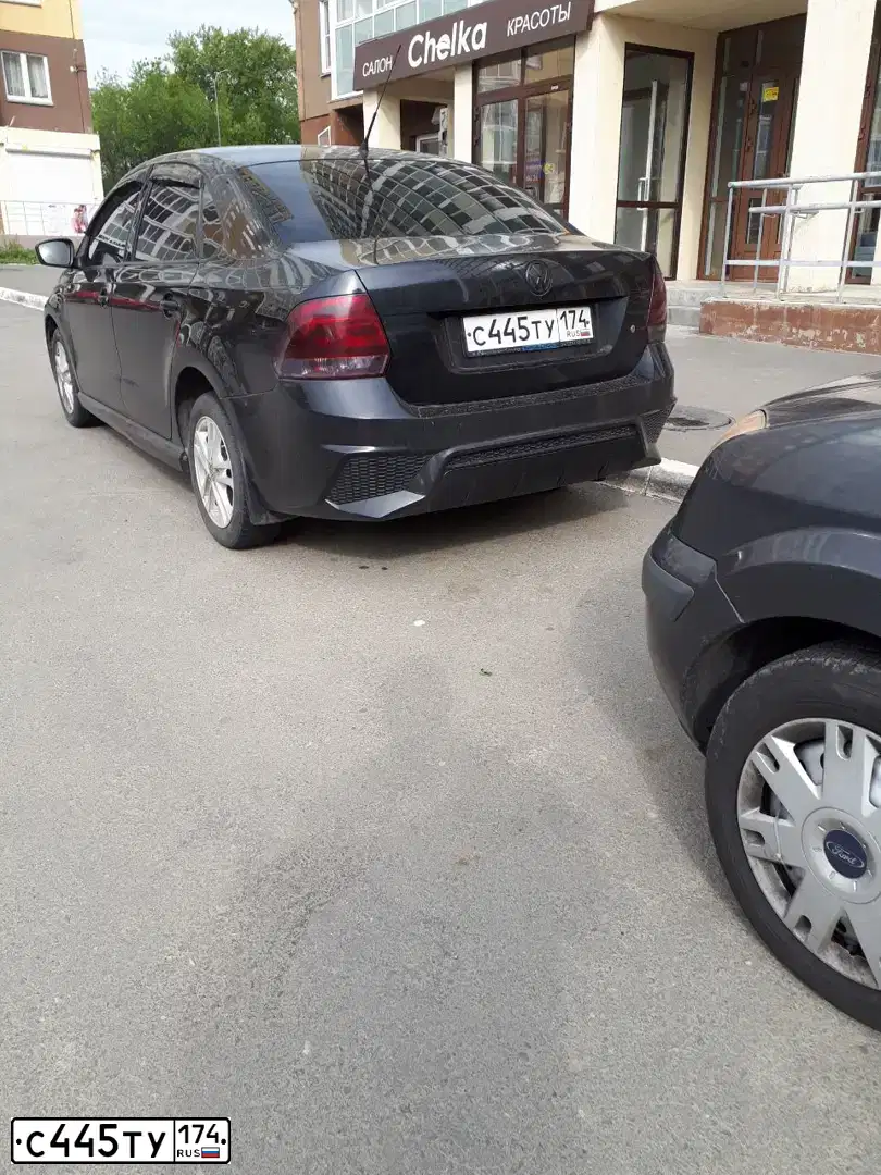 Фото автомобиля VOLKSWAGEN POLO, 2011 — госномер С445ТУ174. Цвет: ЧЕРНЫЙ